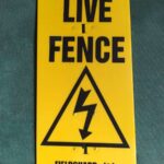 electric fence warning sign